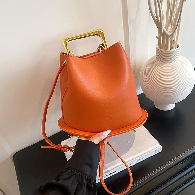 Bucket Hand Bag with Glossy Metal Top Handle & Adjustable Leather Crossbody Strap for All-Season Daily Matching