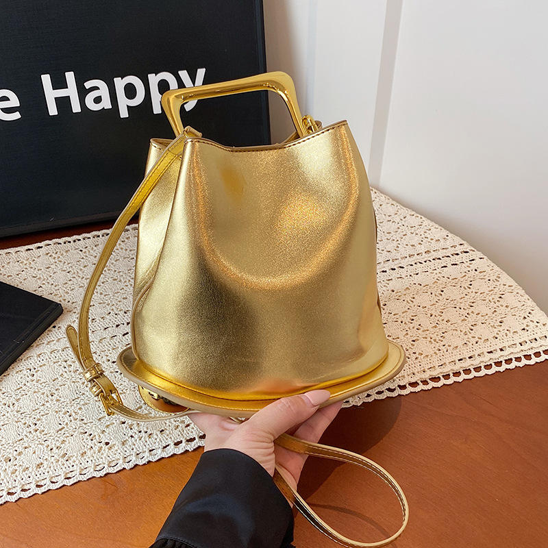 Bucket Hand Bag with Glossy Metal Top Handle & Adjustable Leather Crossbody Strap for All-Season Daily Matching